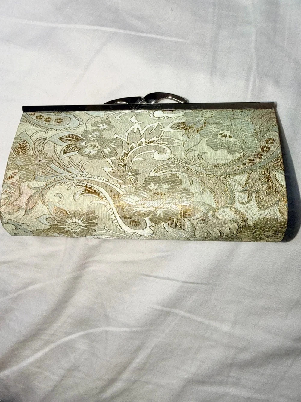 Viintage-style evening clutch features gold/green floral damask metal kiss lock